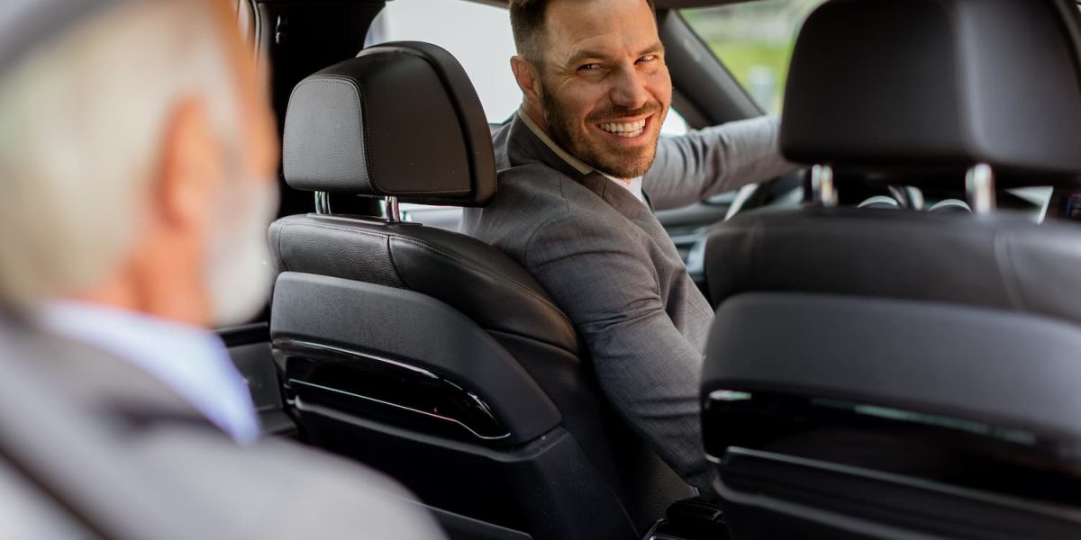 smiling-passenger-engaging-in-friendly-conversatio-2025-02-21-09-05-15-utc-1.jpg